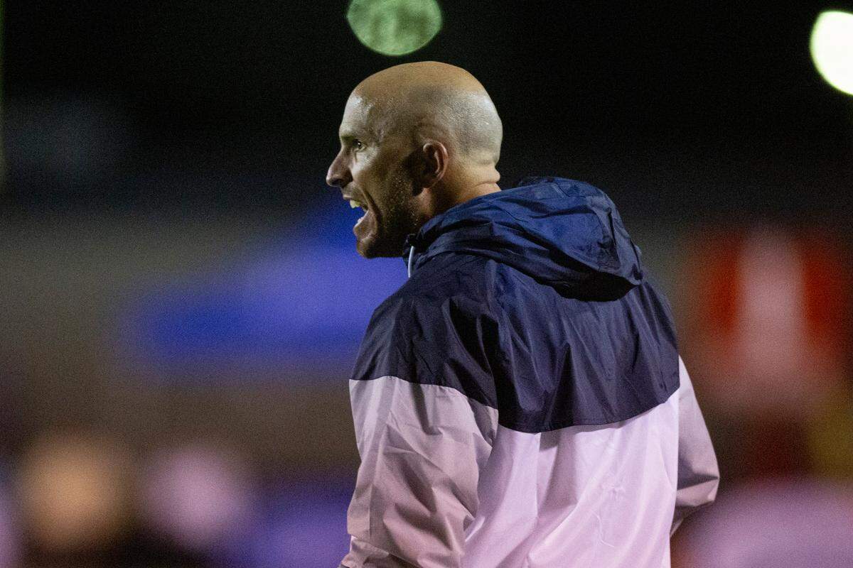 St. Martin head coach Ty Smith yells from the sidelines during a game against Hancock at Joe Barlow Stadium in St. Martin on Friday, Sept. 30, 2022.