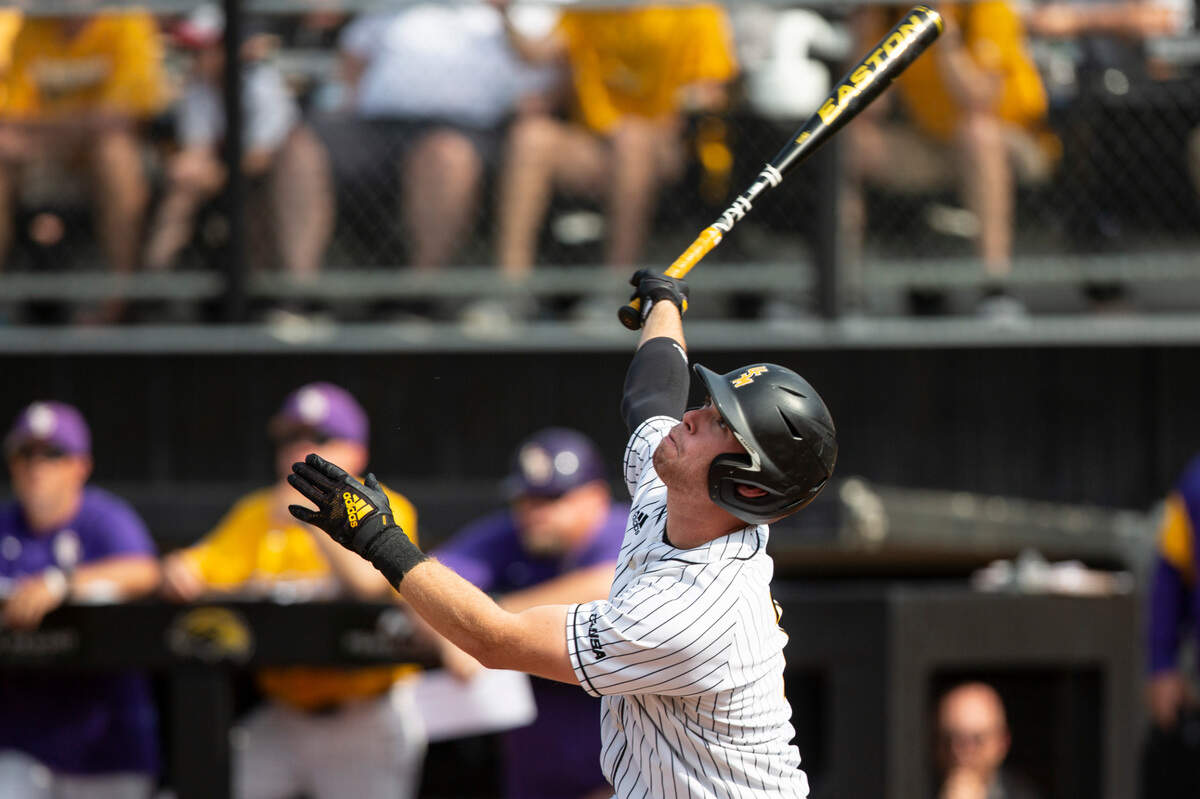 Southern Miss’s Slade Wilks hits a pop up during the NCAA Regionals game at Pete Taylor Park in Hattiesburg on Monday, June 6, 2022.