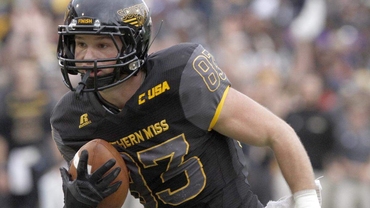 TIM ISBELL/SUN HERALD 
 Southern Miss receiver Casey Martin scores a touchdown against Old Dominion on Nov. 21 in Hattiesburg.