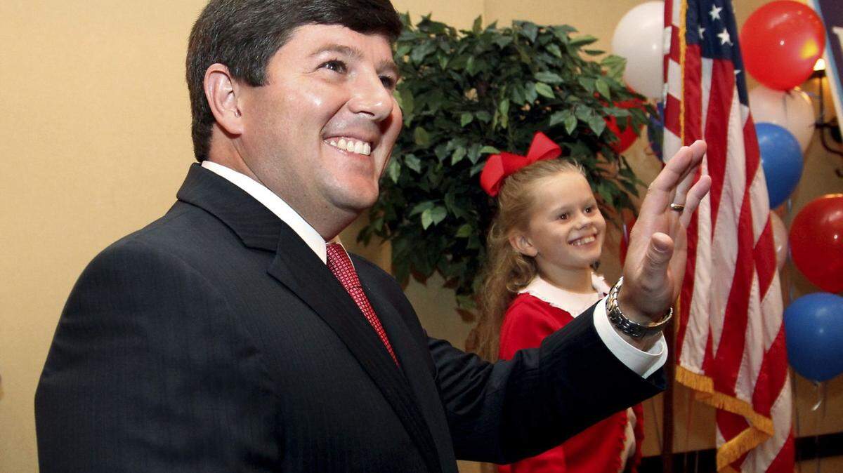 AMANDA MCCOY/SUN HERALD 
 4th District Congressman Steven Palazzo waves to supporters as he celebrates his re-election victory in 2012.
