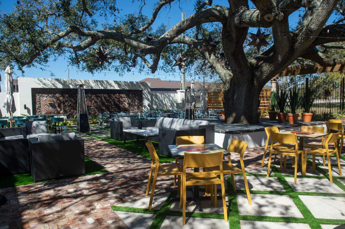 A massive oak tree is the centerpiece of the courtyard at the new Aztecas Restaurant and Cantina in Biloxi.