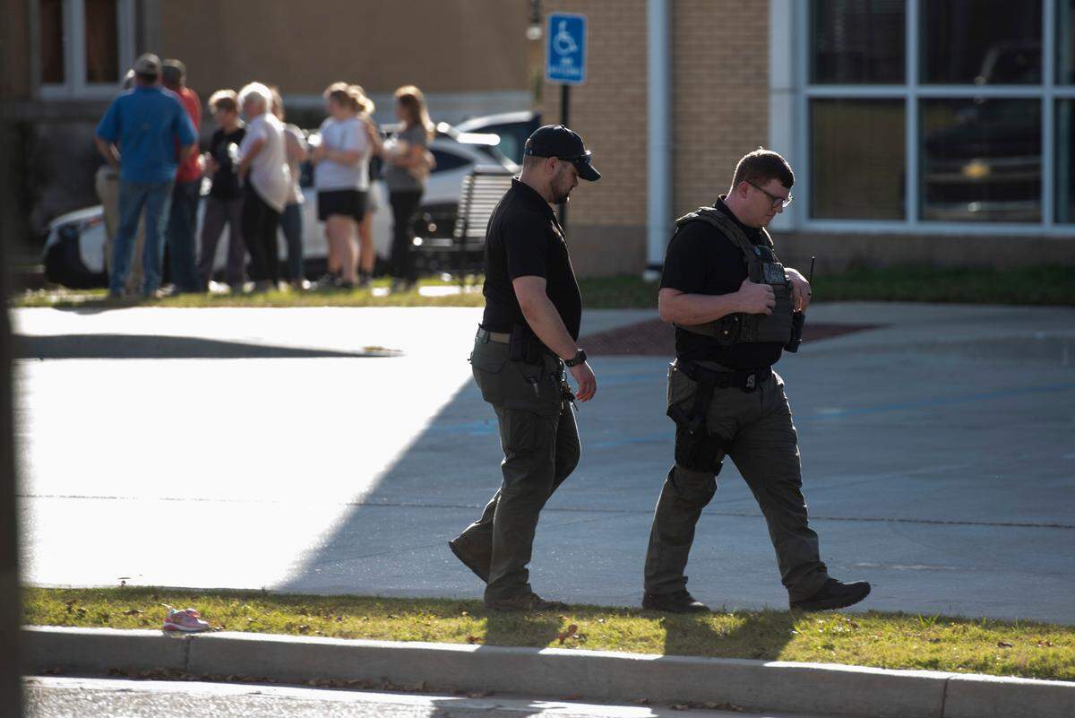 Law enforcement clear the scene of a shooting outside the Pearl River County Courthouse Annex in Poplarville on Tuesday, Dec. 17, 2024. James Ray Saucier, 62, of Poplarville, was shot by his estranged wife outside the building, police say.