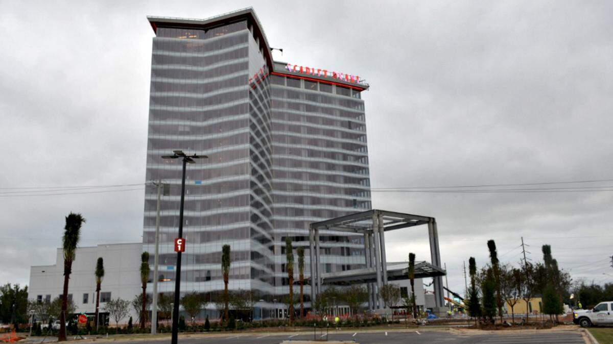 SCARLET PEARL CASINO 
 Palms are being planted as work on the Scarlet Pearl Casino Resort continues for the Dec. 9 opening. The management announced in an email Tuesday that reservations are being accepted at the 300-room hotel.