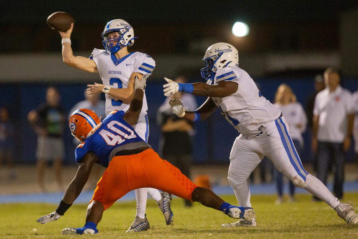 Ocean Springs’ quarterback William Berglind throws a pass during a game against Gulfport at Milner Stadium in Gulfport on Friday, Oct. 27, 2023. Ocean Springs beat Gulfport 30-7.