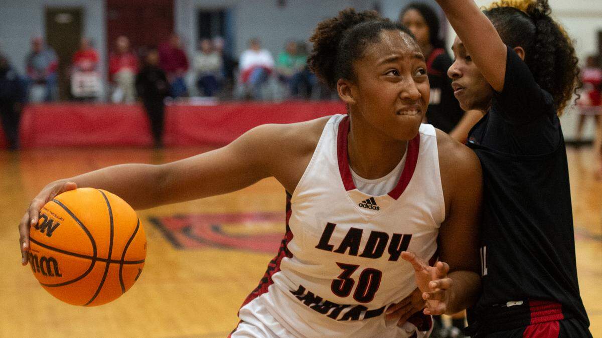 Biloxi’s Shaneal Corpuz goes to the basket during the district title game at Harrison Central High School in Gulfport on Friday, Feb. 10, 2023.