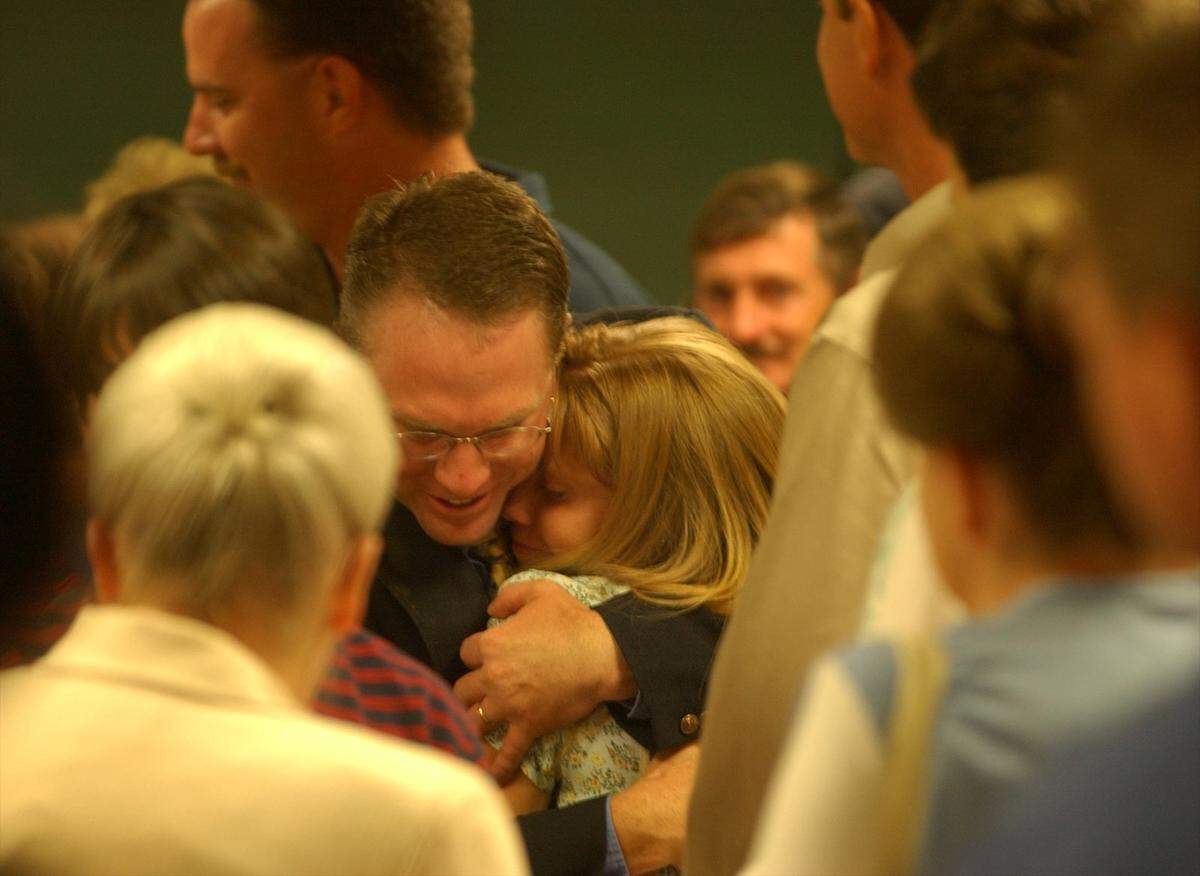 Former Moss Point reserve police officer Steve Strickler is embraced and congratulated after a ‘not guilty’ verdict in Jackson County Circuit Court in Pascagoula, Miss., on Tuesday, June 5, 2002. Strickler was charged with manslaughter in the Sept. 1999 death of jail inmate Marcus Malone.