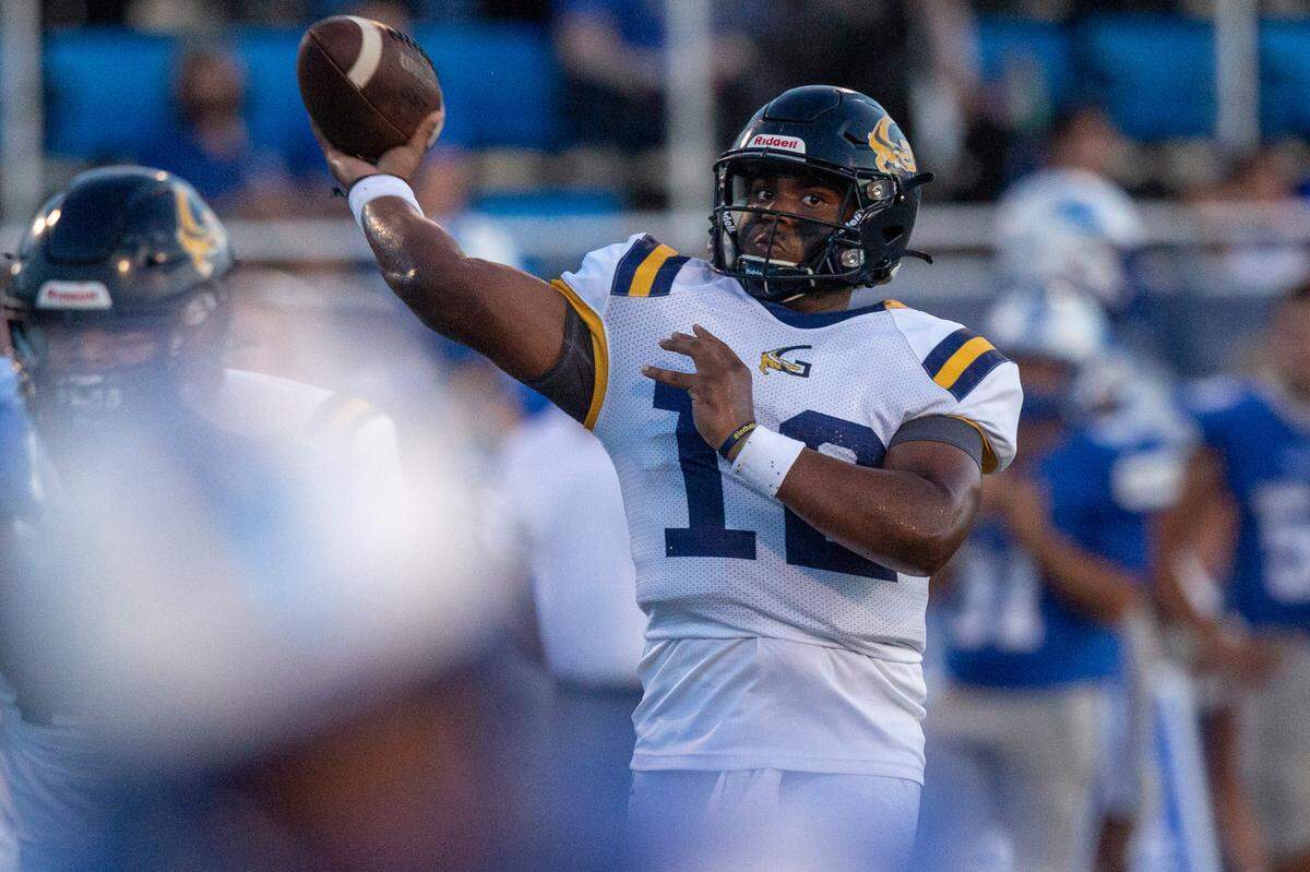 Gautier quarterback Kaden Irving throws a pass during a Jamboree game at Greyhound Stadium in Ocean Springs on Friday, Aug. 19, 2022.