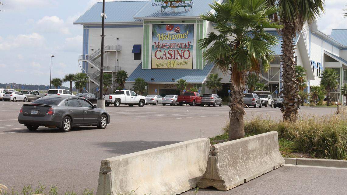 JOHN FITZHUGH/SUN HERALD 
 Concrete barricades have been set up at all but one of the entrances of the Margaritaville Casino parking lot in Biloxi in 2014 after they closed the previous night. The building and 10-acre site with marina are for sale for $18 million.