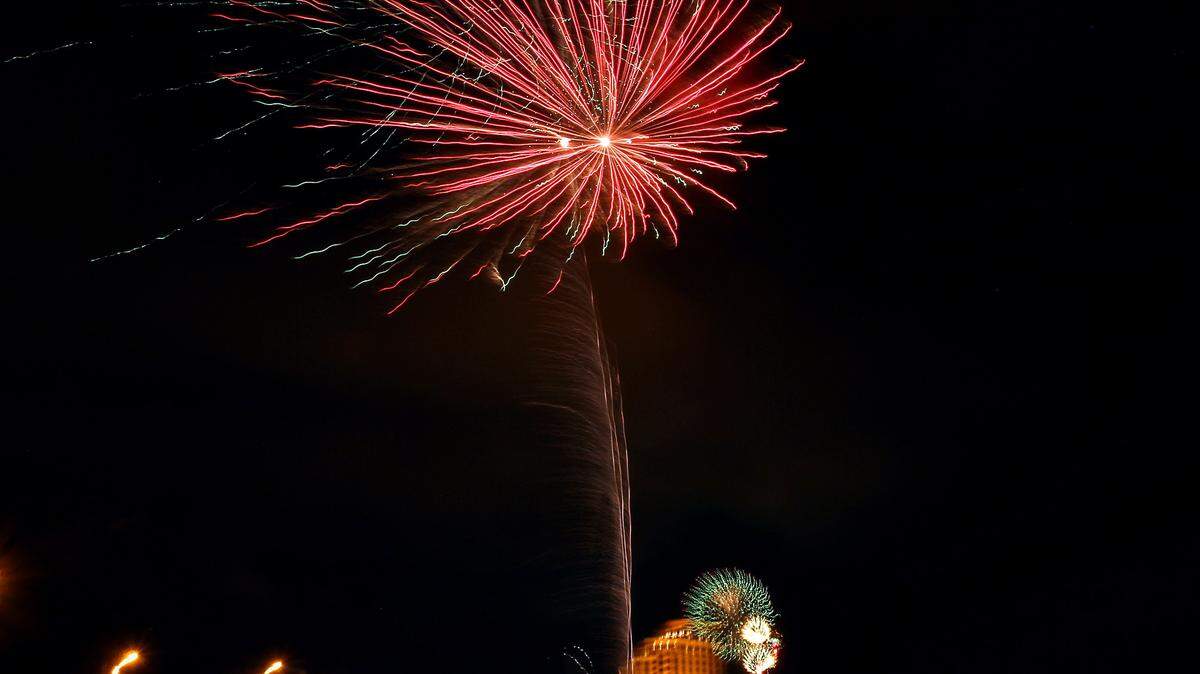 AMANDA McCOY/SUN HERALD 
 Fireworks burst in the air in celebration of Independence Day on Thursday, July 4, 2013, in Biloxi. The city is considering making part of the beach a fireworks-free zone, where people would not be able to shoot their own fireworks from the sand.