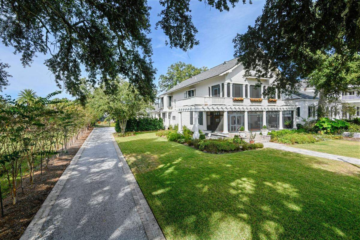Landscaping on this historic home has been done to ensure ample privacy for its residents.