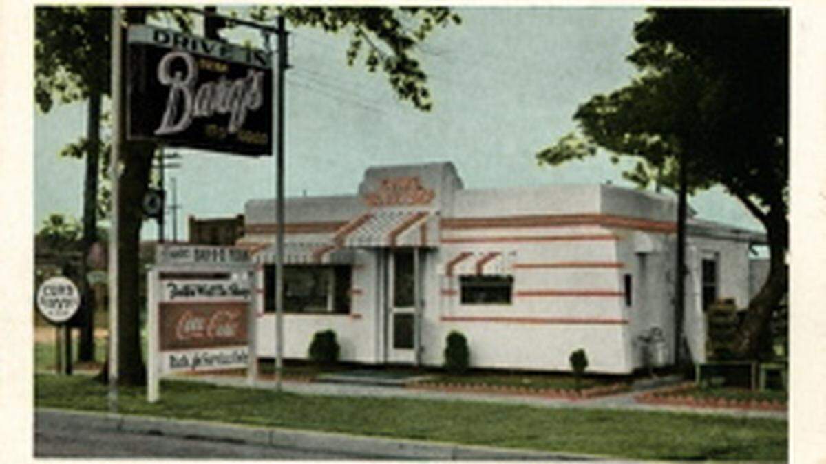 MISS DEPT OF ARCHIVES & HISTORYFalk's Waffle Shop was a popular diner back in the day in downtown Gulfport. This photograph is part of the Cooper Postcard Collection maintained by the Mississippi Department of Archives & History. Note the neon Barq's Root Beer sign.