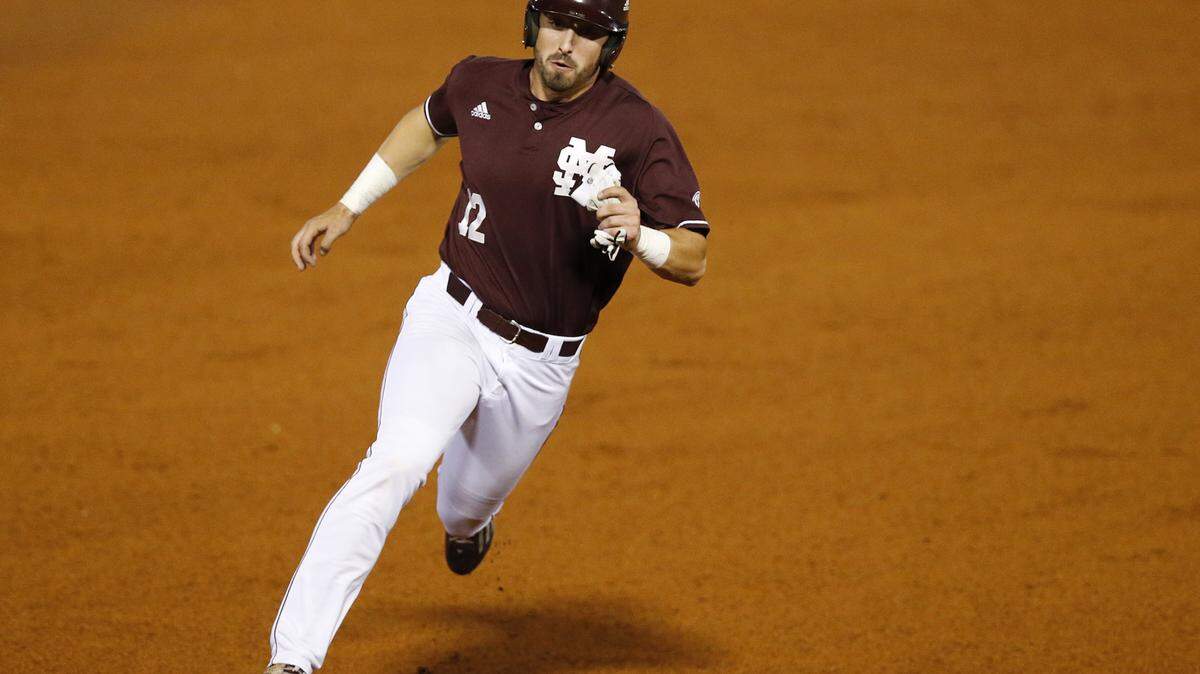 Mississippi State's Reid Humphreys rounds third to score during the seventh inning of a Southeastern Conference NCAA college baseball tournament game against LSU at the Hoover Met, Thursday, May 26, 2016, in Hoover, Ala. (AP Photo/Brynn Anderson)