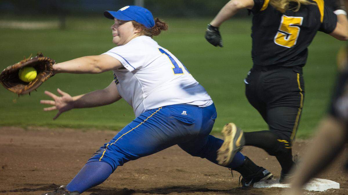 D'Iberville's Cailyn Espey is out at first base during a game against St. Martin on Tuesday. 
 
 Photo/William Colgin