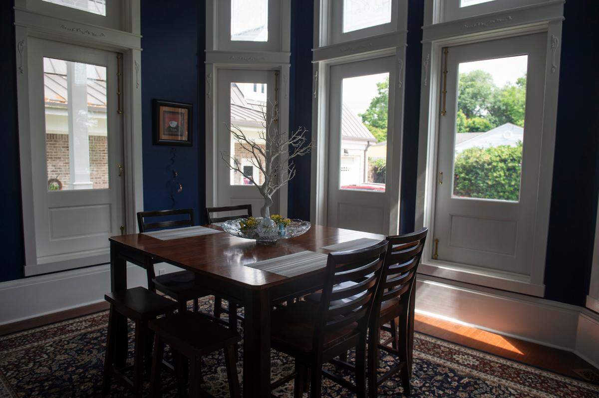 The dining area in Heidi and Dan Hoye’s house in Biloxi on Wednesday, May 14, 2025. They also have seating at a bar and high-top tables in the kitchen for guests who prefer a more casual breakfast.