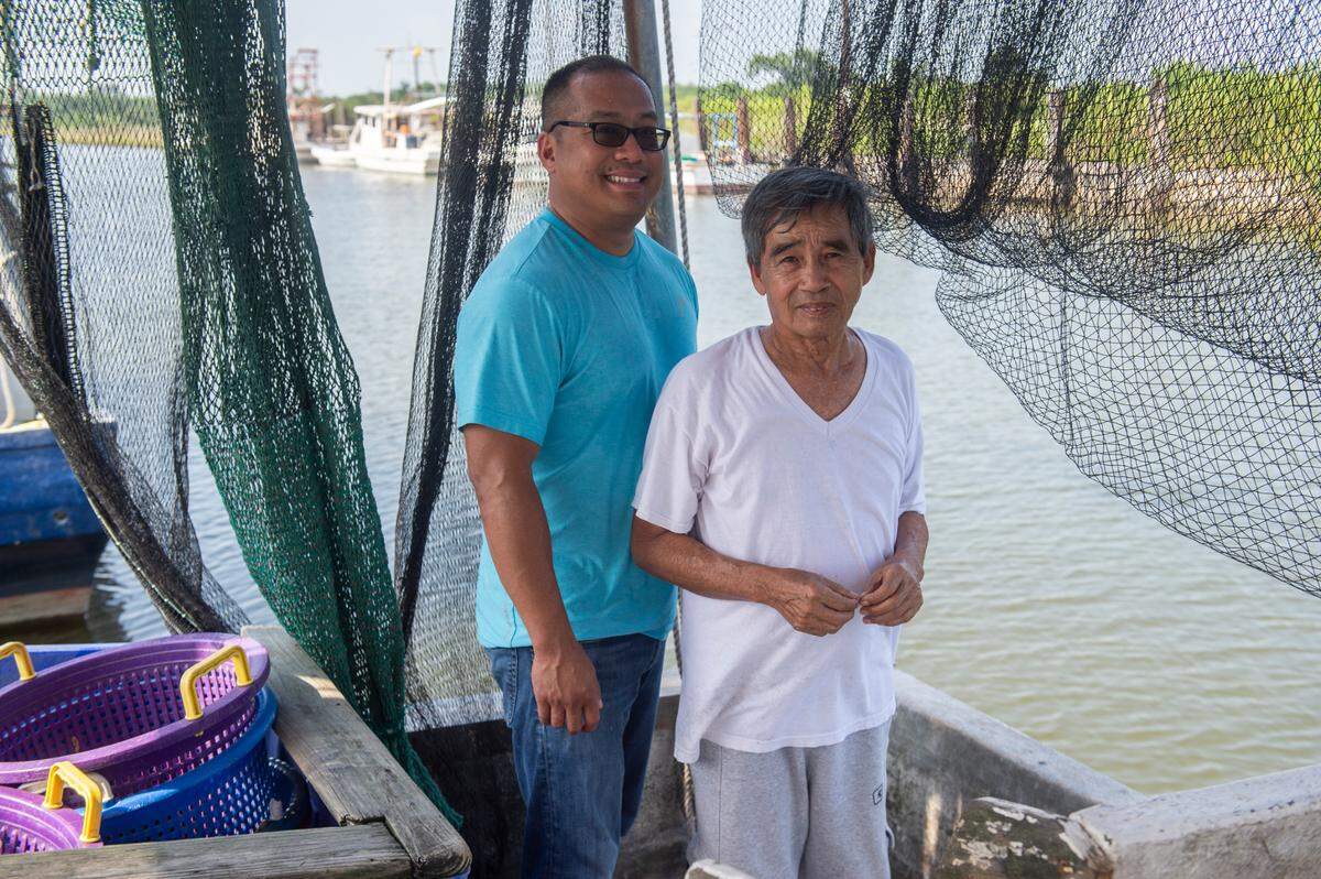 Elvis Ta and his father Sau Truong on Truong’s shrimping boat, Miss Mimi, at Bayou Caddy in Bay St. Louis on Thursday, June 29, 2023.