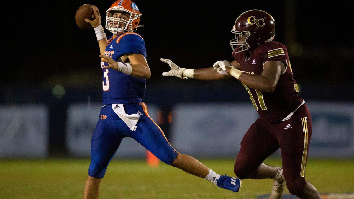 Gulfport quarterback Jacob Palazzo jumps up to throw a pass during a game against George County at Milner Stadium in Gulfport on Saturday, Aug. 27, 2022.