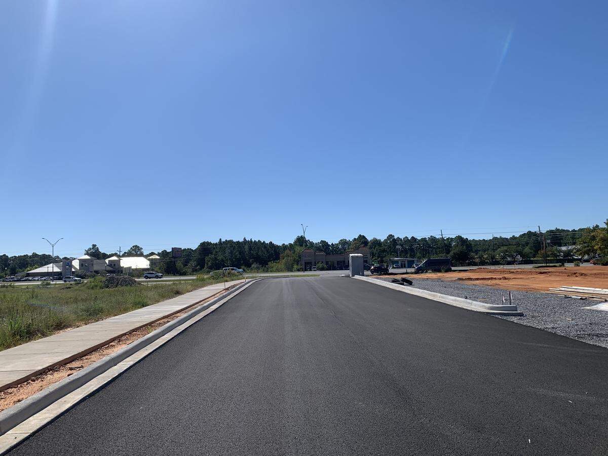 A new driveway will give access to the new Chick-fil-A and Chipotle Mexican Grill restaurants under construction along Bienville Boulevard in Ocean Springs. The site has two more lots for additional restaurants or other commercial projects.