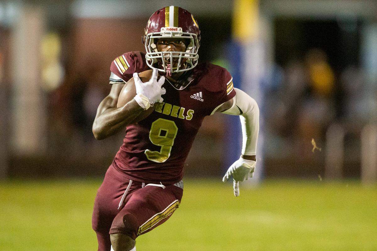 George County’s Amaru Jones runs the ball down the field during a game against Gulfport at Milner Stadium in Gulfport on Friday, Aug. 26, 2022.