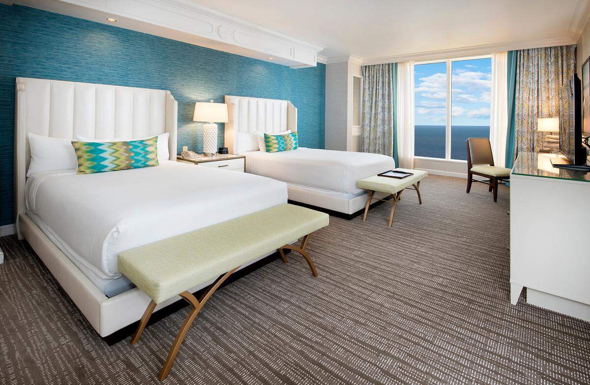 The colors and style of the room remodel at Beau Rivage Resort & Casino in Biloxi were selected to create the feeling of a house at the beach.