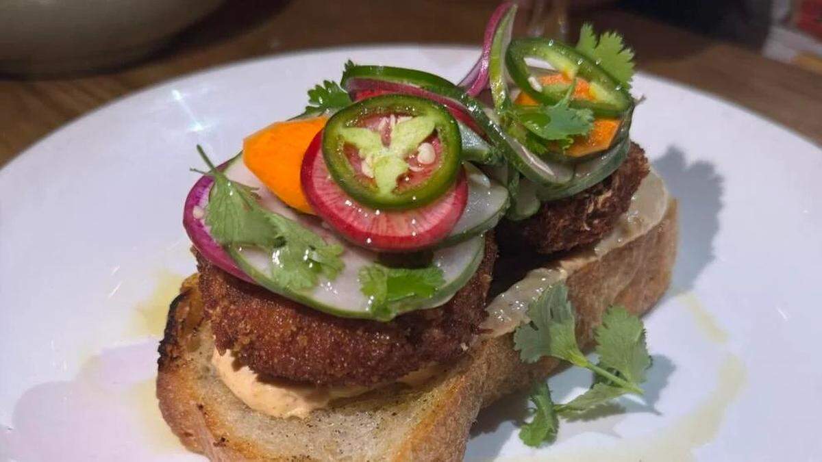 The Boudin Bahn Mi by Chef Austin Sumrall of White Pillars in Biloxi, served at a pop-up event at Mr. Mao on July 22, 2024.