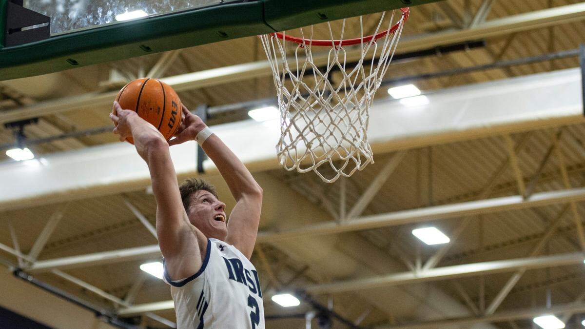 St. Patrick guard Nick Krass goes for a dunk during a game against Perry Central at St. Patrick Catholic High School on Thursday, Jan. 13, 2022.