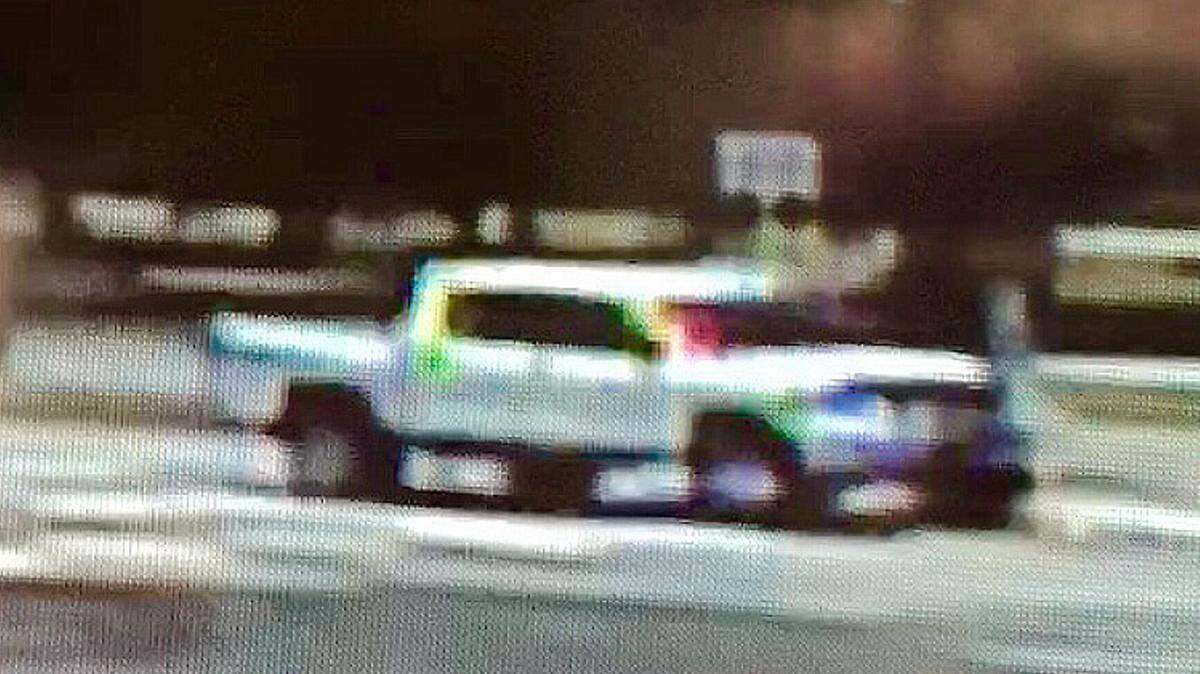 BILOXI POLICE DEPARTMENT 
 Police say this white Nissan Titan is sought in Saturday's hit-and-run in which two riders on a motorcycle were seriously injured.