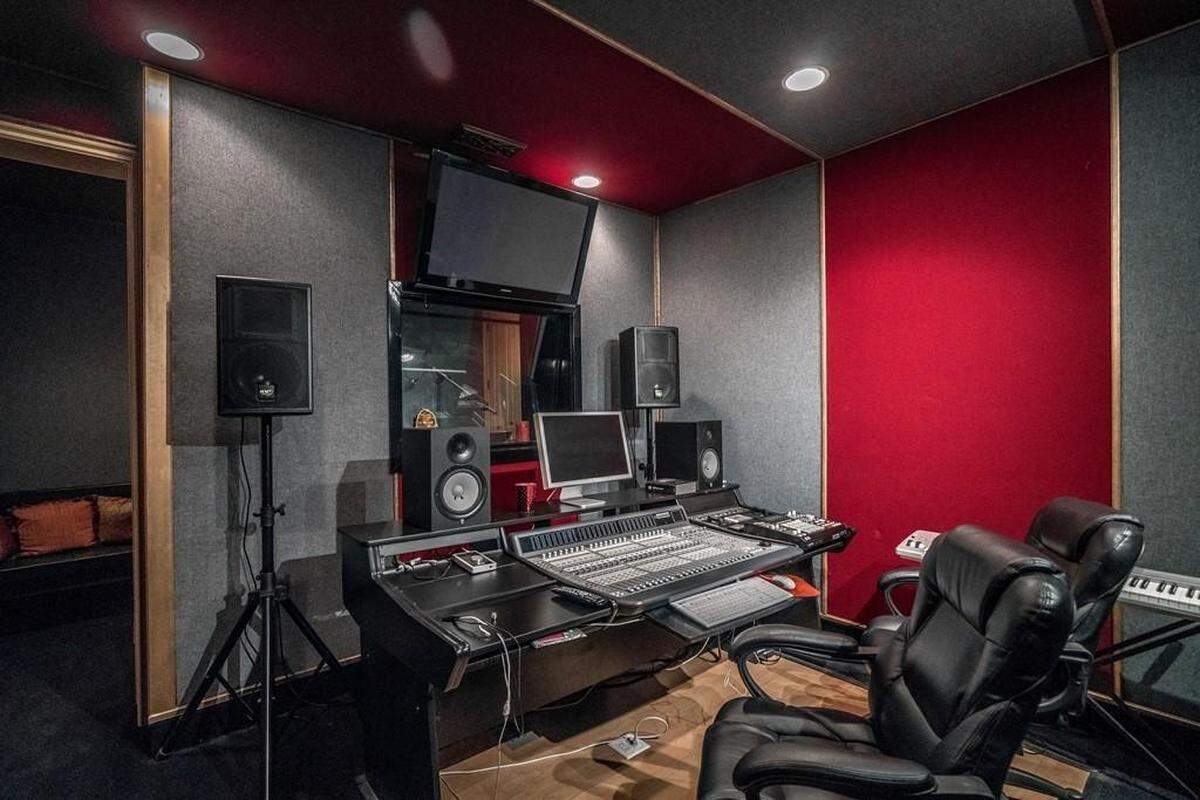 The sprawling estate features a recording studio, wine cellar, cigar room, arcade and more.
