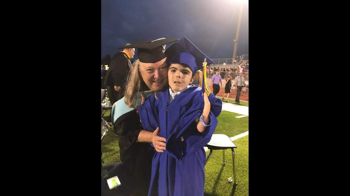Brent David Anderson II enjoyed life to the fullest, despite his developmental disability. He graduated from Bay High School in 2017 and is picture here with his teacher, Liz Bosarge, who said she says that night will always be special to her.
