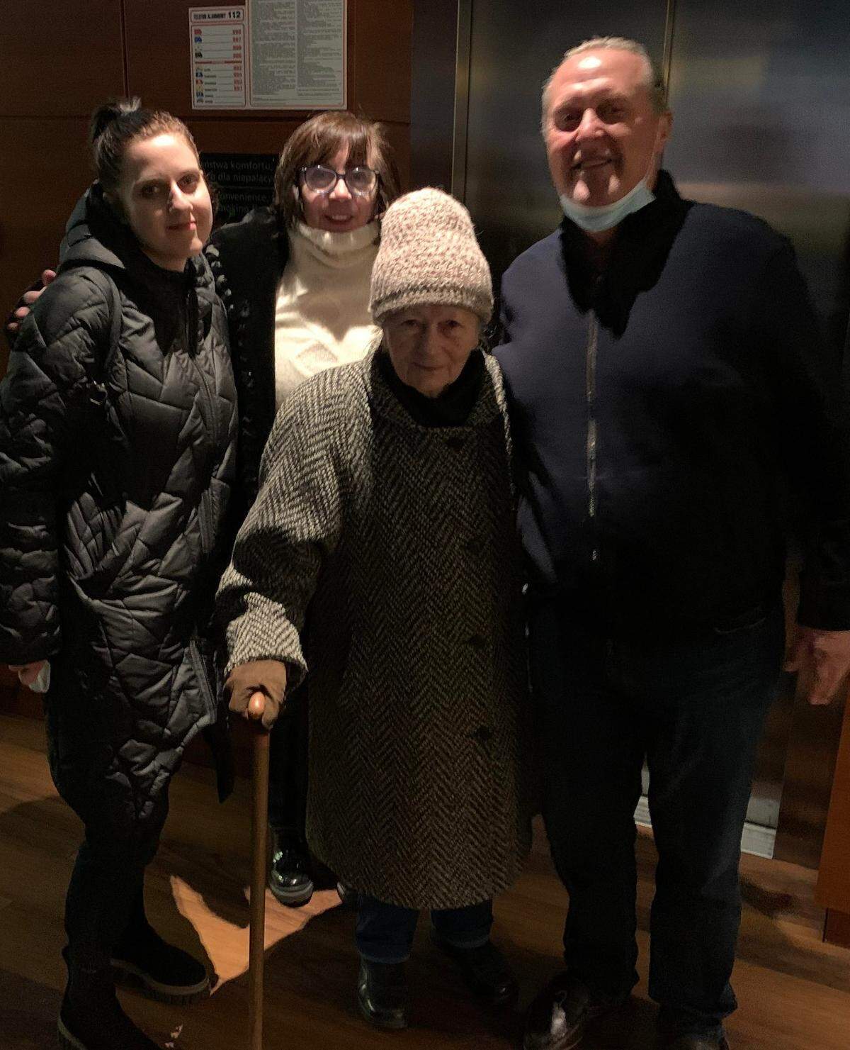 From left, family friend Kaluida Czerwonka-Kmiotczyk, Antonina Godfrey, Hanna Khmyz and Bruce Godfrey return to Warsaw hotel after reuniting at Poland border.