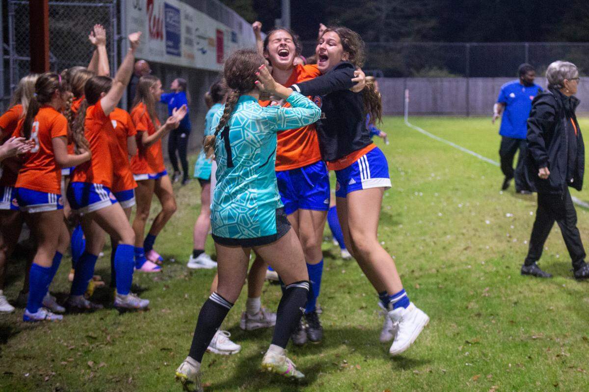 Members of the Gulfport girls soccer team celebrate after their teammate scored a goal in the second half of the 6A South State Championship game in Gulfport on Tuesday, Jan. 31, 2023.