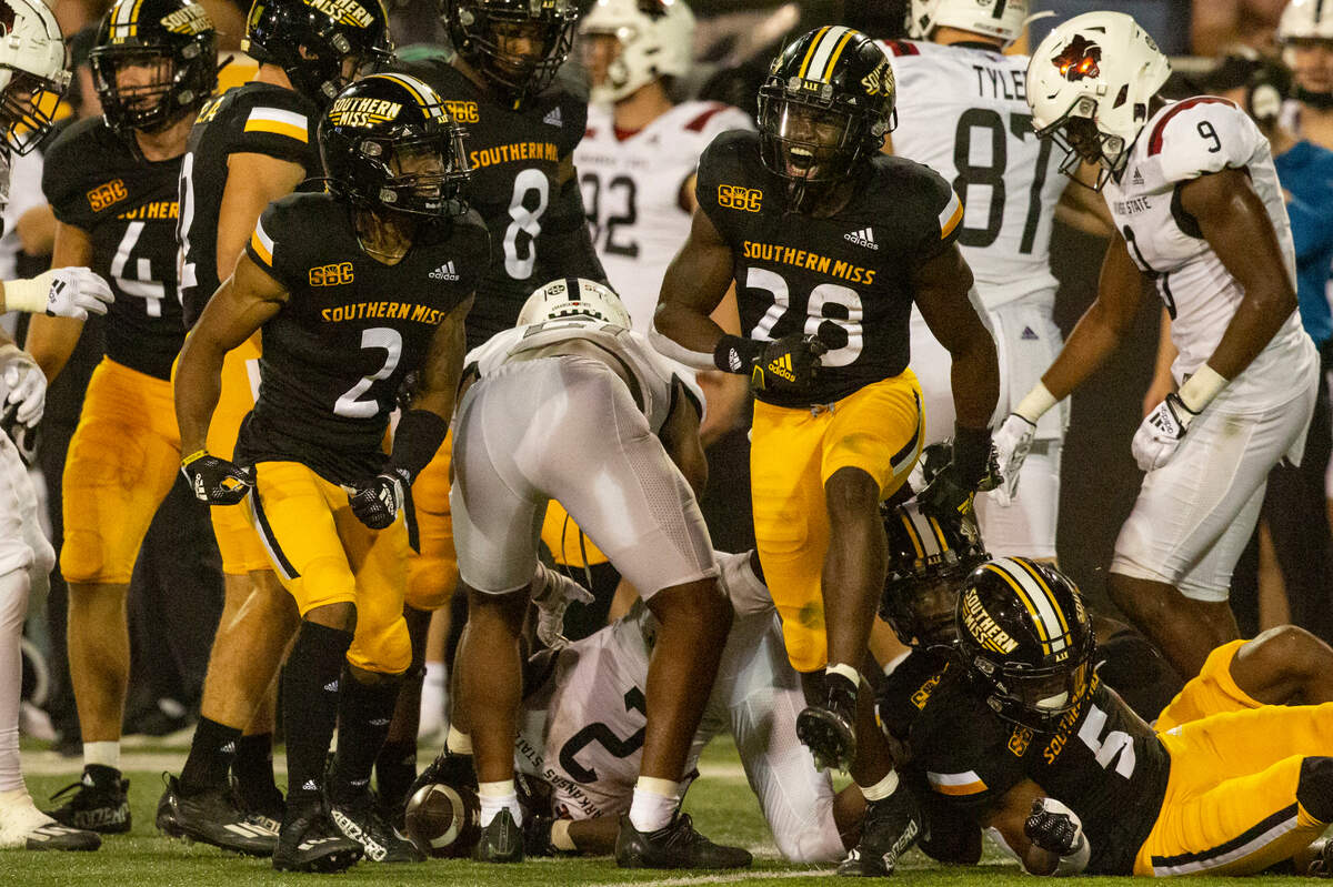 Southern Miss Golden Eagles linebacker Swayze Bozeman (28) celebrates after a tackle during a game against Arkansas State at M.M. Roberts Stadium in Hattiesburg on Saturday, Oct. 15, 2022.