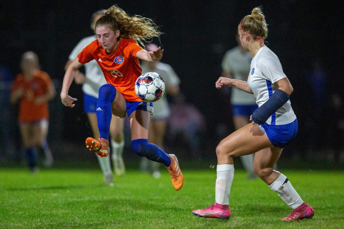 Gulfport’s Mary Frances Symmes blocks a shot with her body during the 6A South State Championship game in Gulfport on Tuesday, Jan. 31, 2023.
