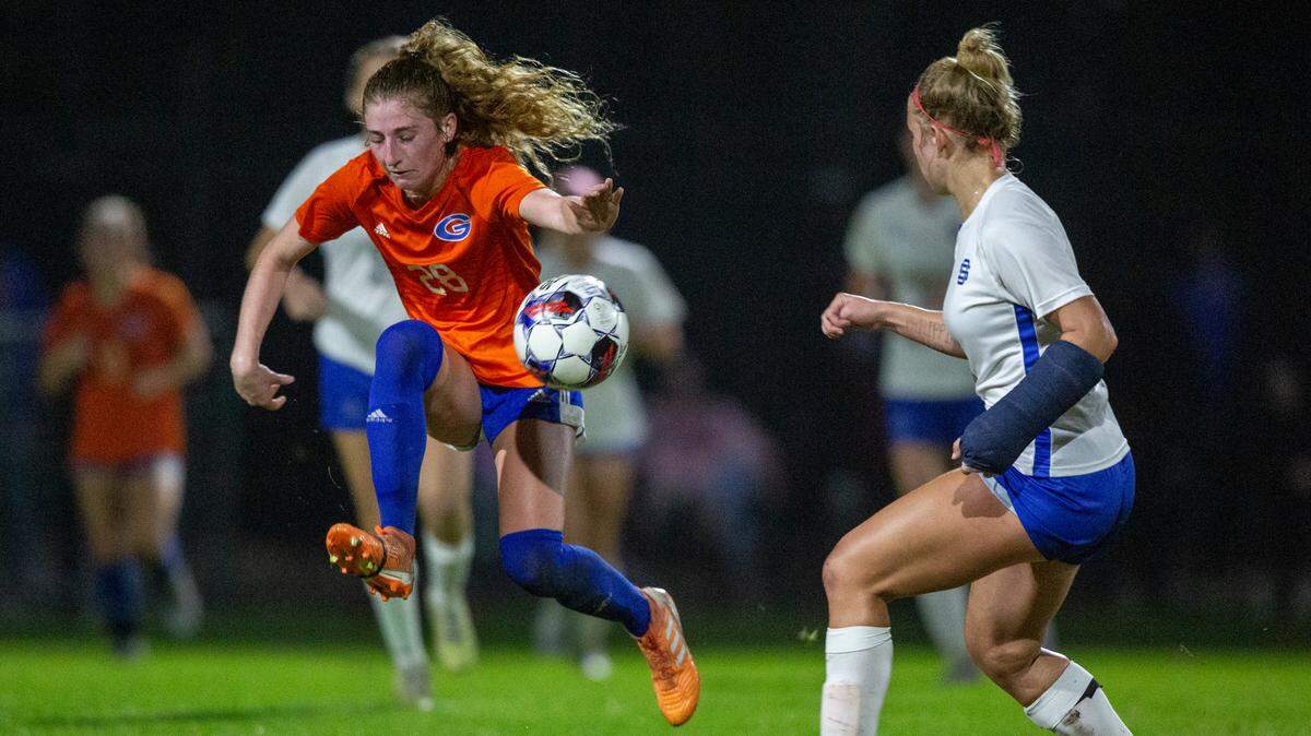 Gulfport’s Mary Frances Symmes blocks a shot with her body during the 6A South State Championship game in Gulfport on Tuesday, Jan. 31, 2023.