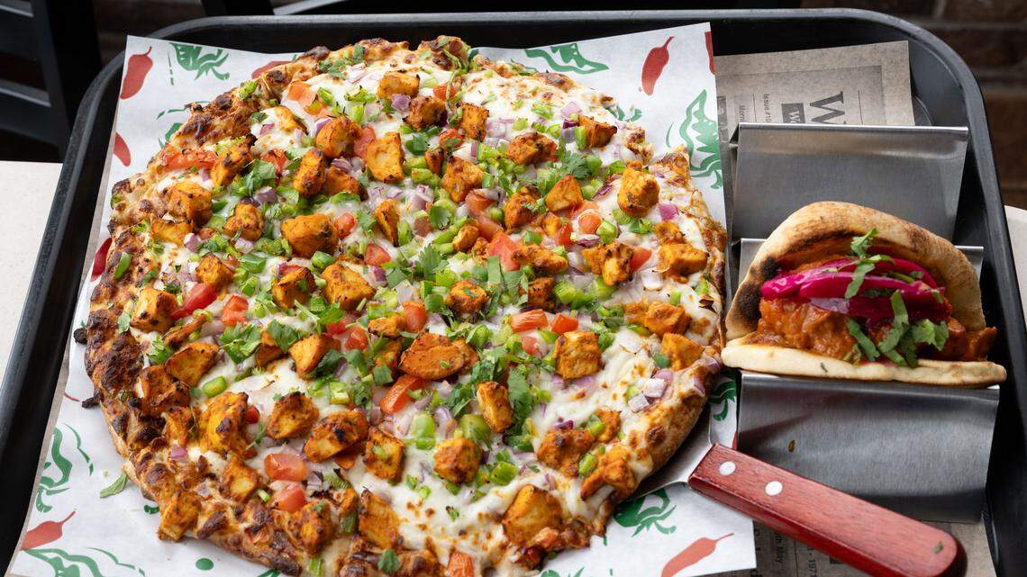 We tried the spiciest pizza at Gulfport’s unique Indian spot. Here’s the scoop