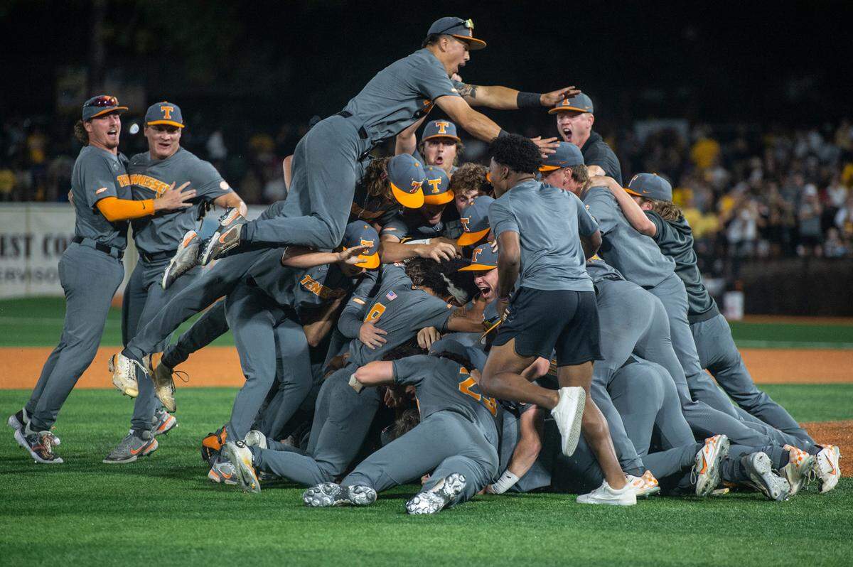 The Tennessee Volunteers celebrate after winning the NCAA Super Regional at Pete Taylor Park in Hattiesburg on Monday, June 12, 2023.