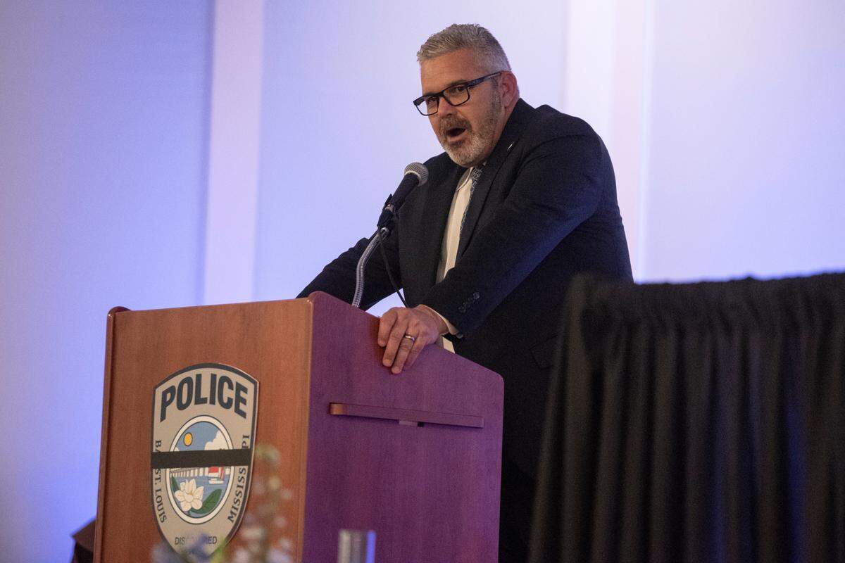 State Rep. Brent Anderson delivers a eulogy for Branden Estorffe during the funeral of Bay St. Louis police officers Sgt. Steven Robin and Branden Estorffe at the Bay St. Louis Community Center in Bay St. Louis on Wednesday, Dec. 21, 2022. Anderson was a police officer with Branden Estorffe’s father, Ian.