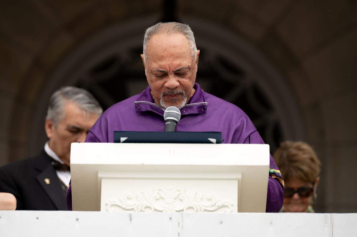 Reverend John Whitfield gives a speech before the Gulf Coast Carnival Association’s Fat Tuesday parade in Biloxi on Tuesday, Feb. 17, 2026.