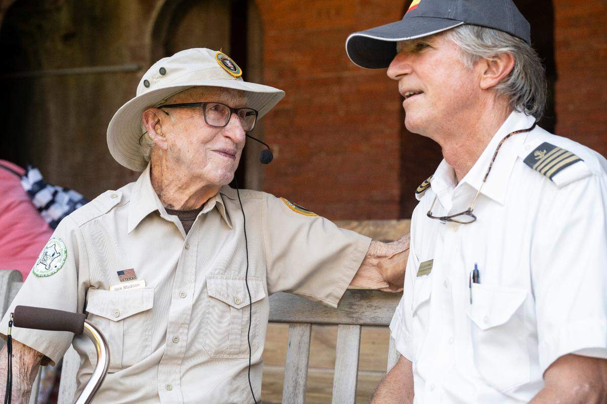 Jack Madison, a volunteer tour guide for Gulf Islands National Seashore, talks with his friend Captain Louis Skrmetta of Ship Island Excursions on Madison’s birthday on Friday, July 11, 2025.