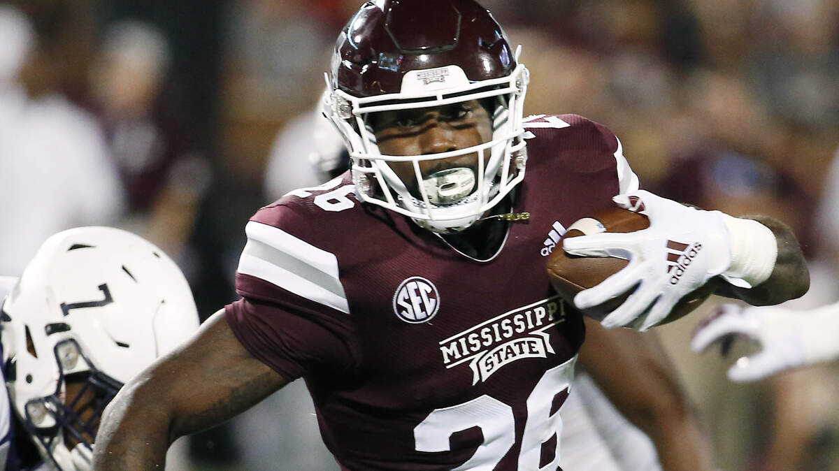 Mississippi State running back Aeris Williams (26) looks for running room against Stephen F. Austin on Saturday in Starkville. MSU won 63-6.