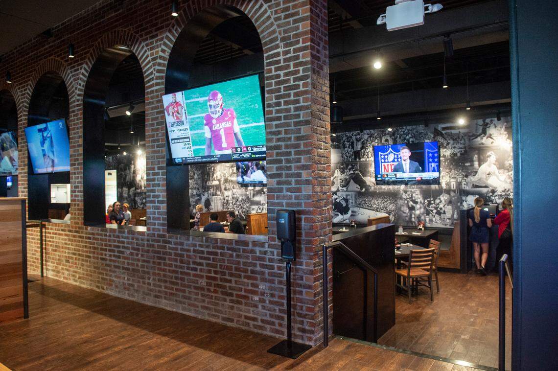 Brick archways separate the dining areas at Walk-On’s Sports Bistreaux in D’Iberville. The restaurant is handicapped accessible.