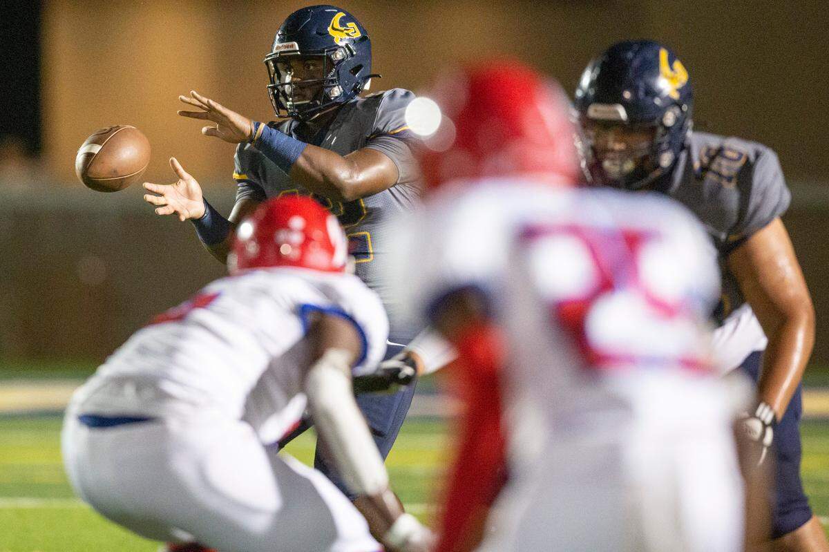Gautier quarterback Caden Irving catches the snap during a game against Pascagoula at Gautier High School in Gautier on Friday, Sept. 2, 2022.