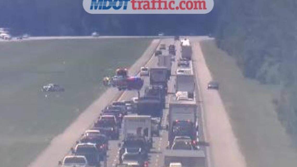 Update: Crashed car moved out of median, I-10 traffic returns to full speed