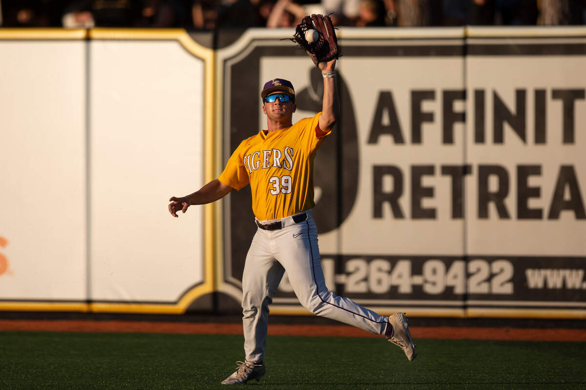 LSU outfielder Josh Pearson catches a ball during Game Four of NCAA Regionals at Pete Taylor Park in Hattiesburg on Saturday, June 4, 2022.
