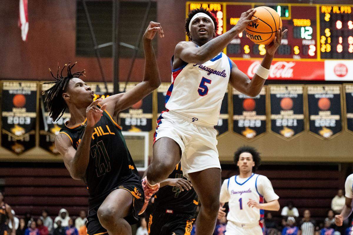 Pascagoula’s Ireyion Harvey (5) jumps to lay up the ball during a boys basketball game at Pearl River Community College on Wednesday, Feb. 25, 2026.