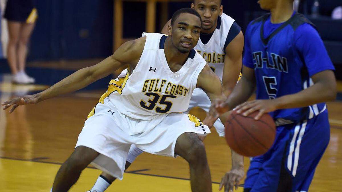 RICH KOPP/MGCCCC 
 Mississippi Gulf Coast's Anfernee Hampton (35) and Deshawn Jones defend against Copiah-Lincoln on Thursday in Perkinston.