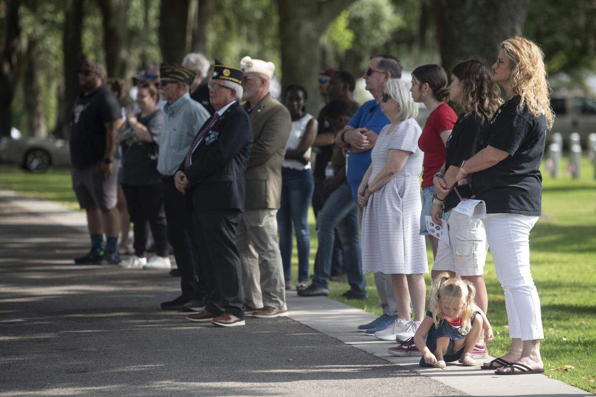 Gold star families attend a Memorial Day ceremony at Biloxi National Cemetery in Biloxi on Monday, May 26, 2025.