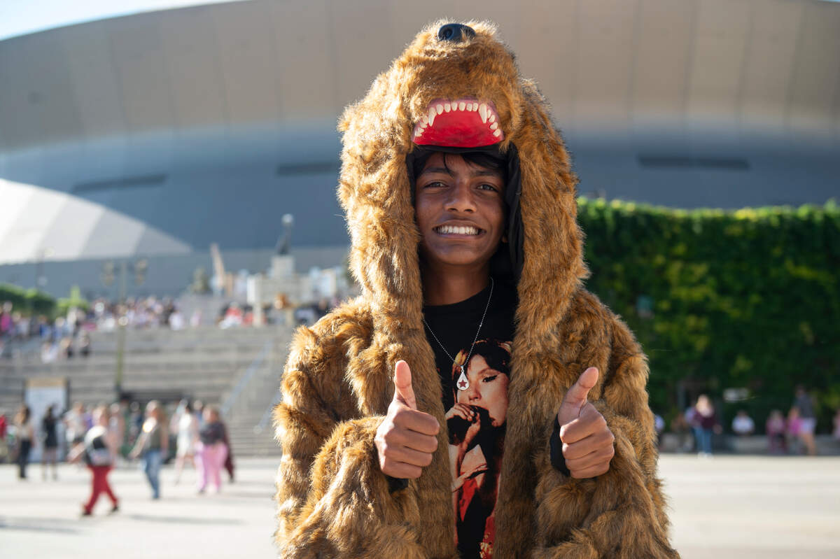 Srihan Veeram, of Atlanta, Ga., shows off his Eras Tour outfit outside the Cesars Superdome in New Orleans on Friday, Oct. 25, 2024, before Taylor Swift’s Eras Tour performance that night.