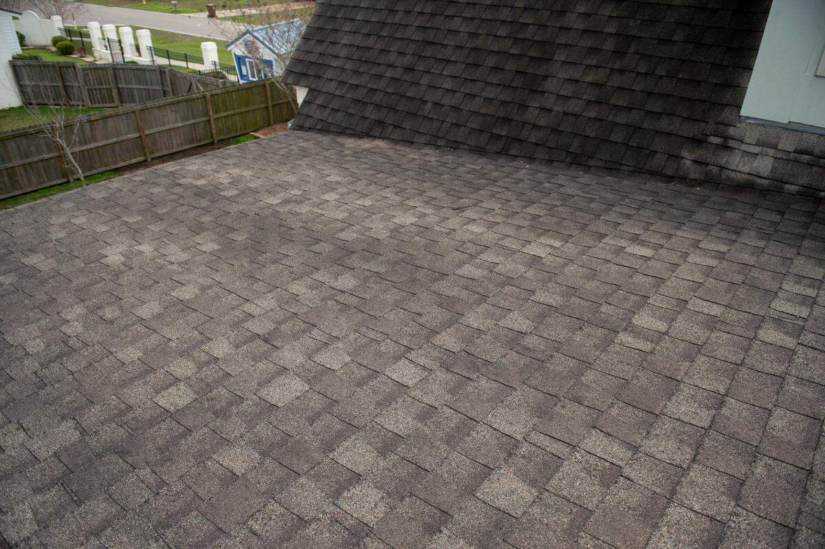 Dark spots that indicate leaks and rot on the roof of Teresa Teague’s St. Jude Dream Home on Thursday, March 14, 2024. Water doesn’t run off the roof, inspectors say, because it is too flat for architectural shingles.