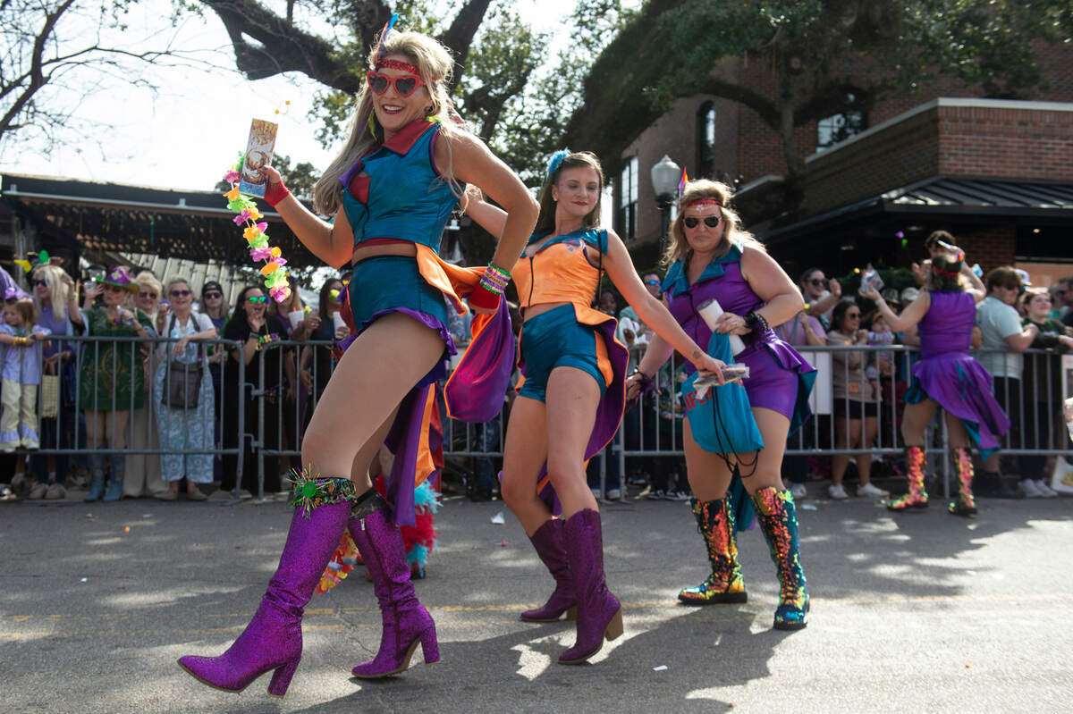 Dancers during the Ocean Springs Elks Club Mardi Gras Parade in Ocean Springs on Saturday, Feb. 15, 2025.