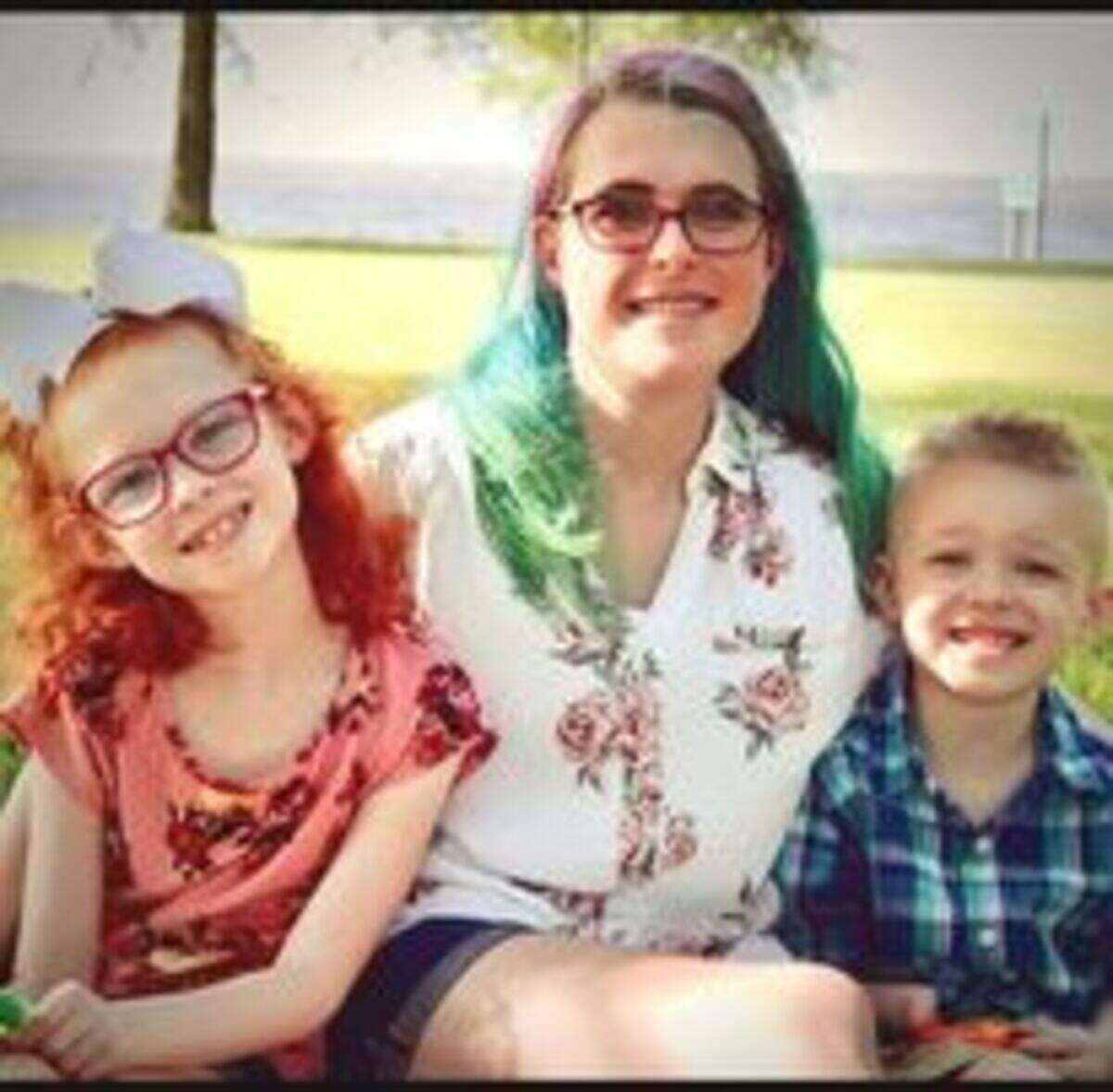 Danielle Herrick, center, chose to pull her two kids from in-person school in the Harrison County School District because her son has Poland syndrome, a rare disease that would make him more vulnerable to serious consequences from COVID-19.